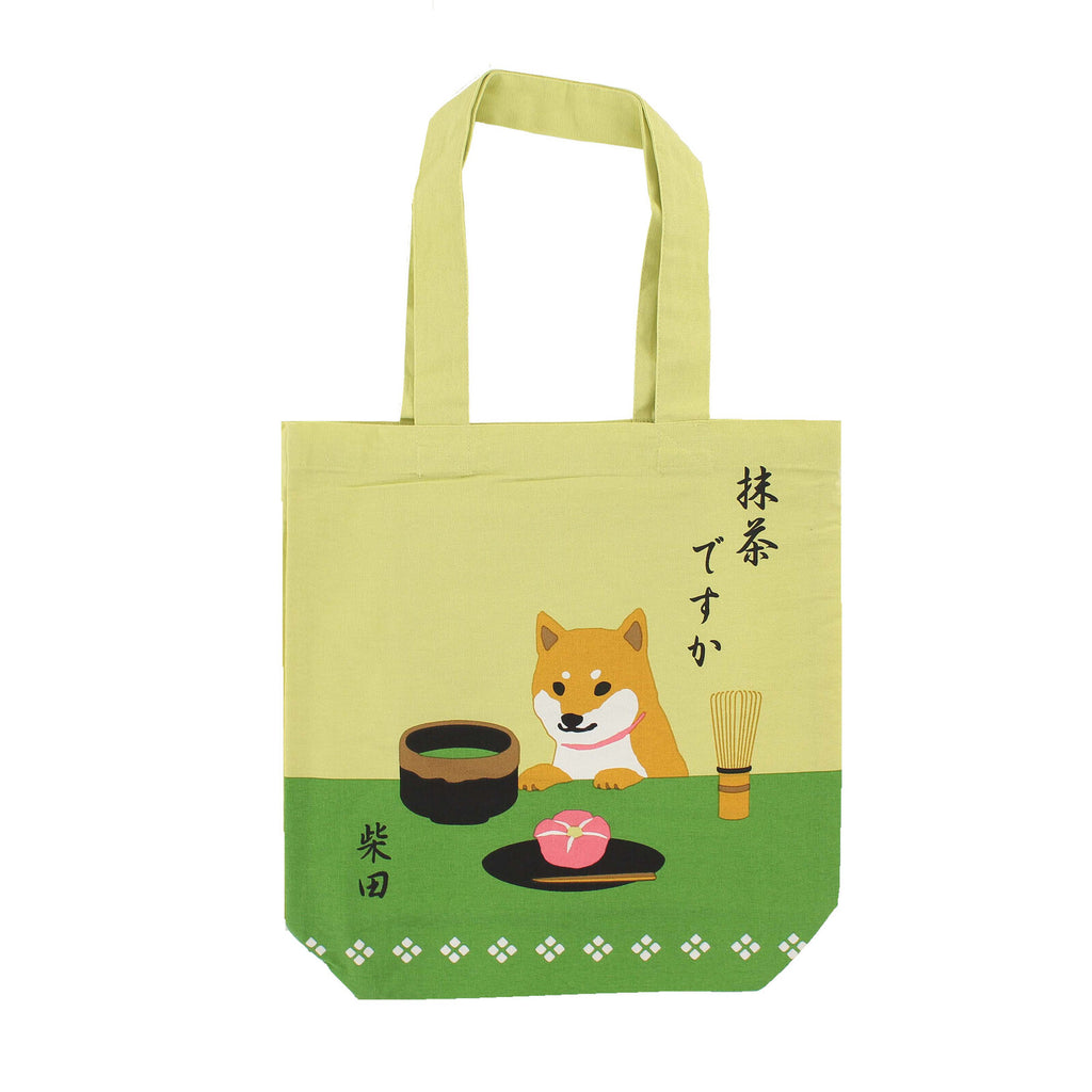 Matcha green cotton tote bag showcasing a Shiba Inu in a serene Japanese tea setting, perfect for adding cultural flair to your daily carry.