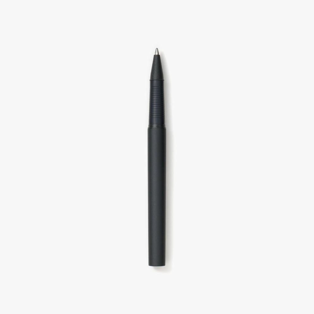 Sleek Kakimori Aluminium Ballpoint Pen with a distinguished textured matte finish, highlighted by a subtle logo on the end-cap, featuring a medium tip size.