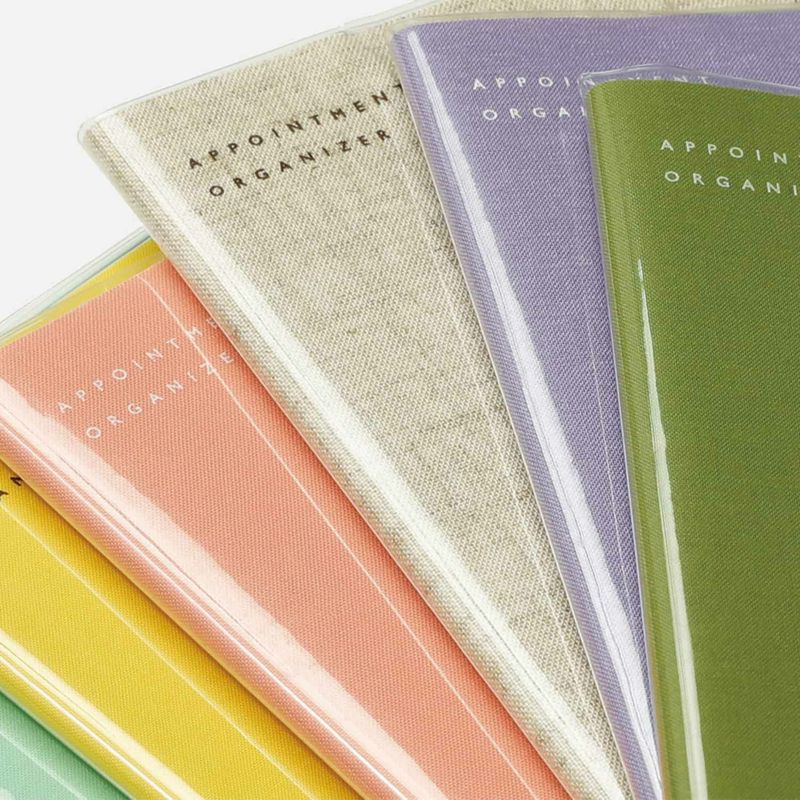 Hightide 2024 Cotton Monthly Diary displaying its clean and simple design, wrapped in a clear cover revealing the soft pastel fabric underneath.