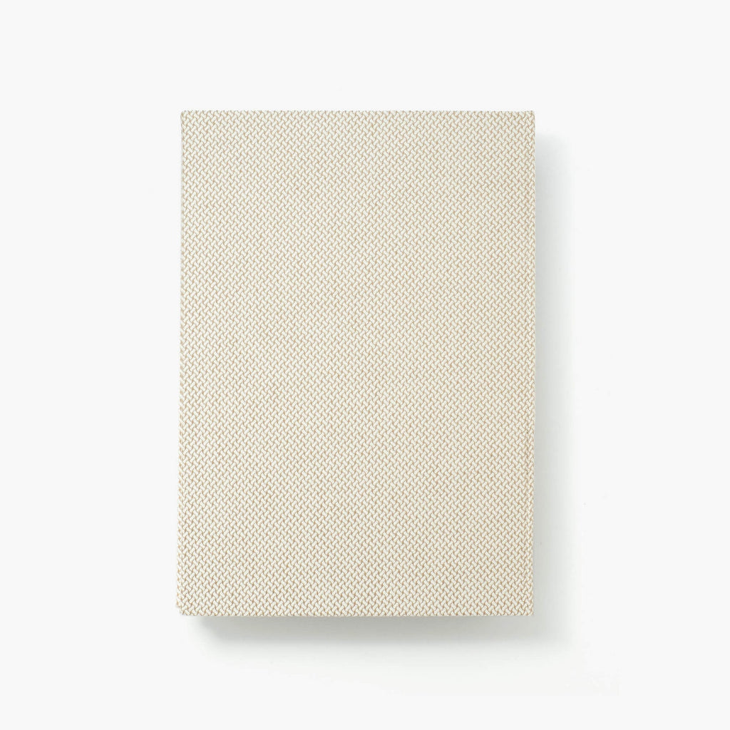 Kakimori A5 Notebook - Banshu-ori 05 with a distinctive woven pattern and light grey grid pages.