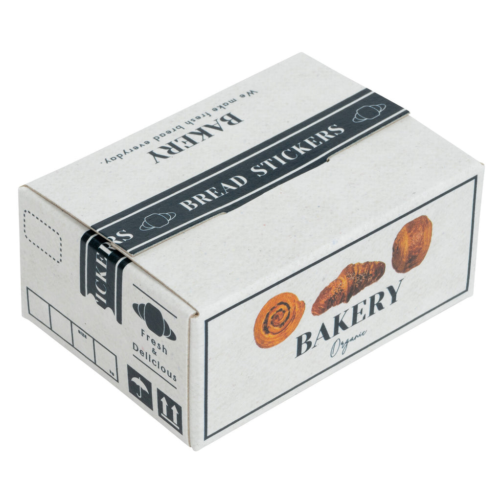 A compact, recyclable cardboard box with black and white bakery-themed designs and text.