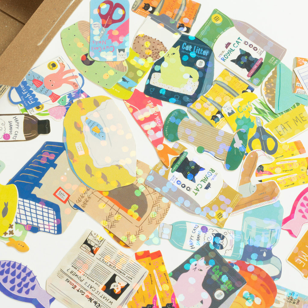 A spread of colourful, assorted cat-themed stickers in various shapes and designs.