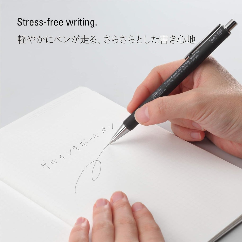 A hand holding a Stalogy pen, effortlessly writing Japanese characters, illustrating the stress-free writing it provides.