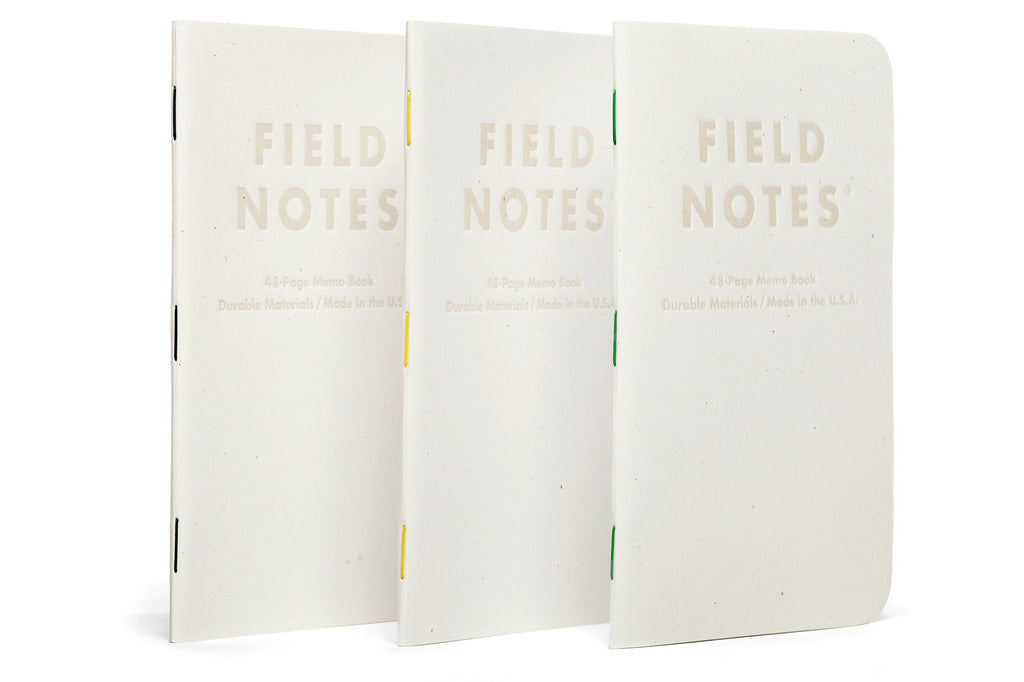 Field Notes Birch Bark Limited Edition Notebook with speckled white cover and multi-coloured staples.