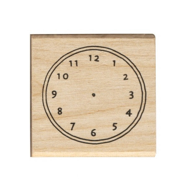 Wooden stamp featuring a classic clock face design, perfect for bullet journaling or planners. Measurements: 45 x 45 x 24mm.