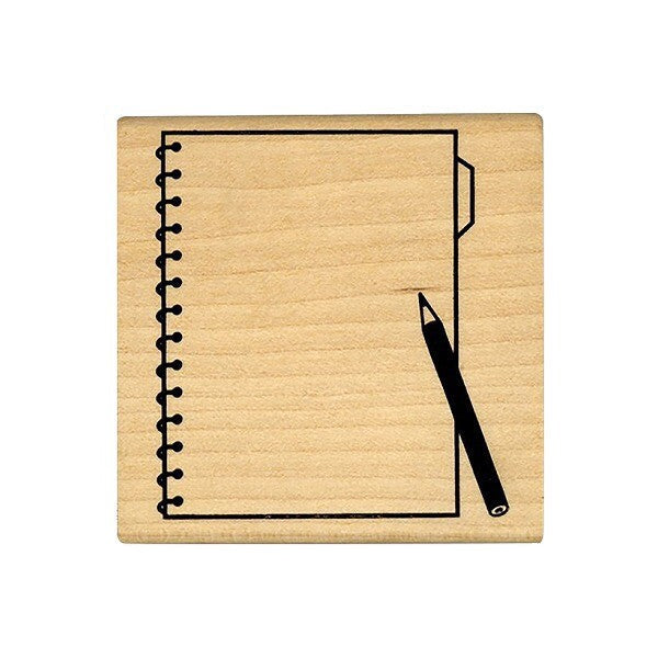 Wooden stamp featuring a spiral-bound notebook page with a pencil design, perfect for bullet journaling or planners. Measurements: 45 x 45 x 24mm.