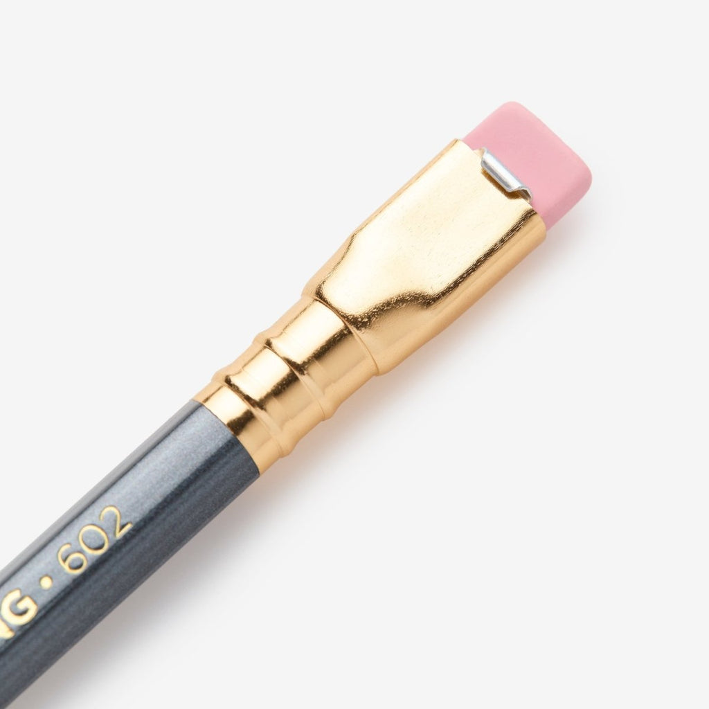 Gold ferrule and pink replaceable eraser detail on the Blackwing 602 pencil.