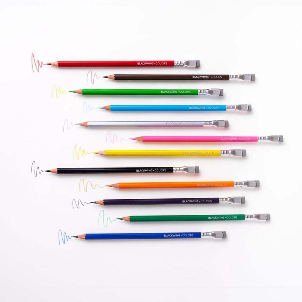 Assorted Blackwing Colors pencils laid out on a white surface showing the full range of colours.