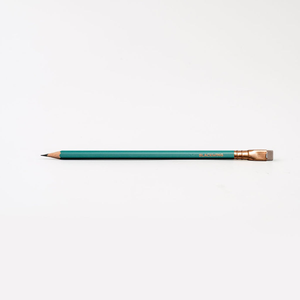 Single Blackwing Matte Green pencil shown horizontally with green barrel, gold ferrule and natural wood tip.