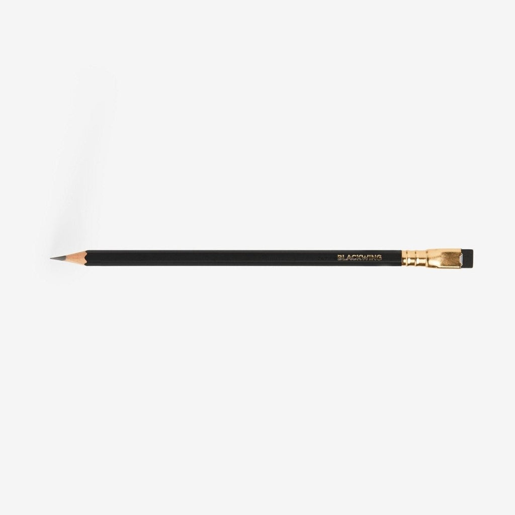 Single Blackwing Matte pencil shown horizontally with black barrel, gold ferrule and black eraser.
