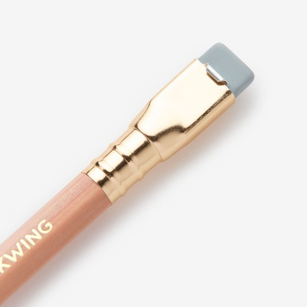 Close-up of the Blackwing Natural’s gold ferrule with grey replaceable eraser.