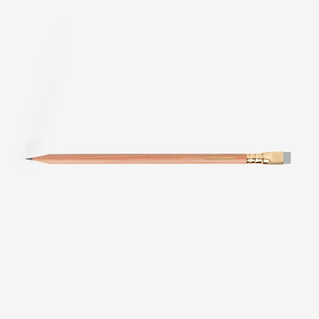 Single Blackwing Natural pencil shown horizontally with natural cedar barrel and gold ferrule.