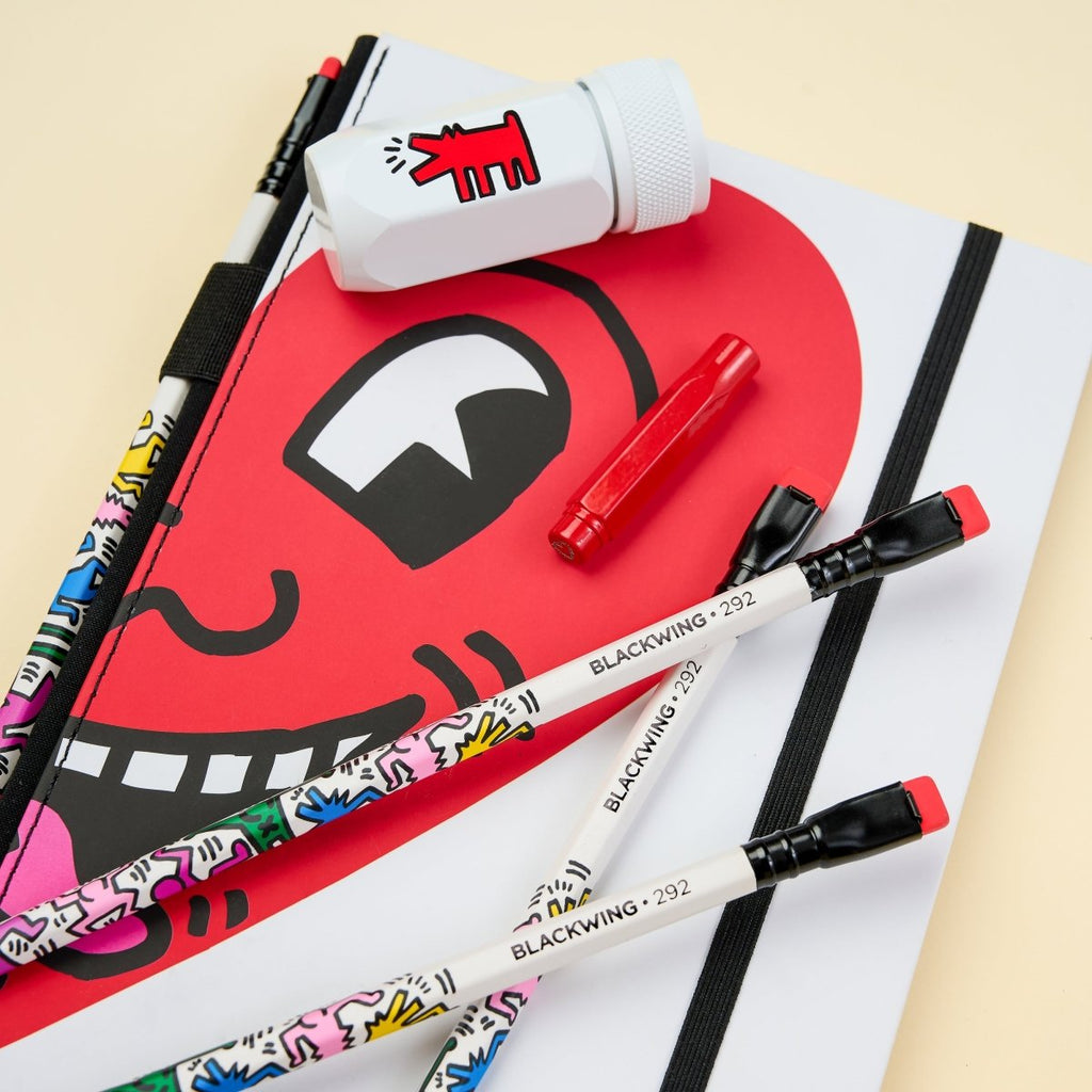 The Journal Shop - Blackwing Volume 292 Gift Set Keith Haring Smiling Heart edition full set with pink folder, pencils, notebook and eraser.