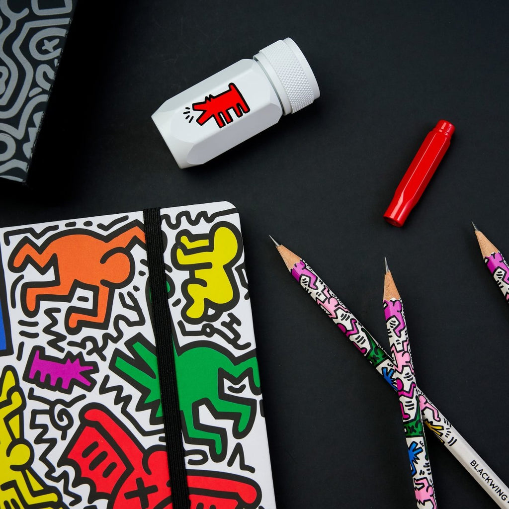 The Journal Shop - Blackwing Volume 292 Gift Set Keith Haring Tokyo Pop-Shop edition eraser, pencils and notebook displayed.