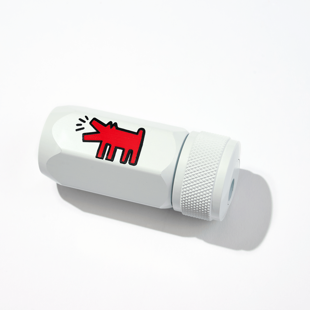 The Journal Shop - Blackwing Volume 292 One-Step Sharpener Keith Haring Dog edition in white with red dog illustration.