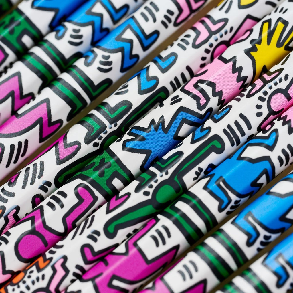The Journal Shop - Blackwing Volume 292 Keith Haring edition pencils grouped together highlighting colourful patterns.