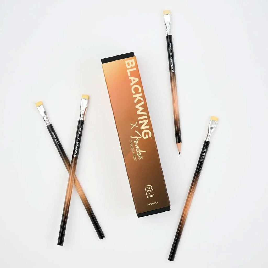 Blackwing x Fender Limited Edition Pencil box with four pencils arranged around it on a white background.