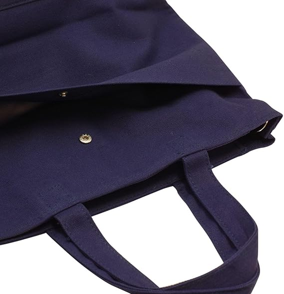 Close-up of the external snap pocket on the Delfonics Rollbahn Small Bag, ideal for quick-access items.