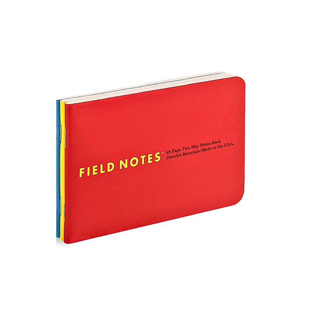 Field Notes Two-Way Memo Book in red shown slightly angled to reveal its slim profile.