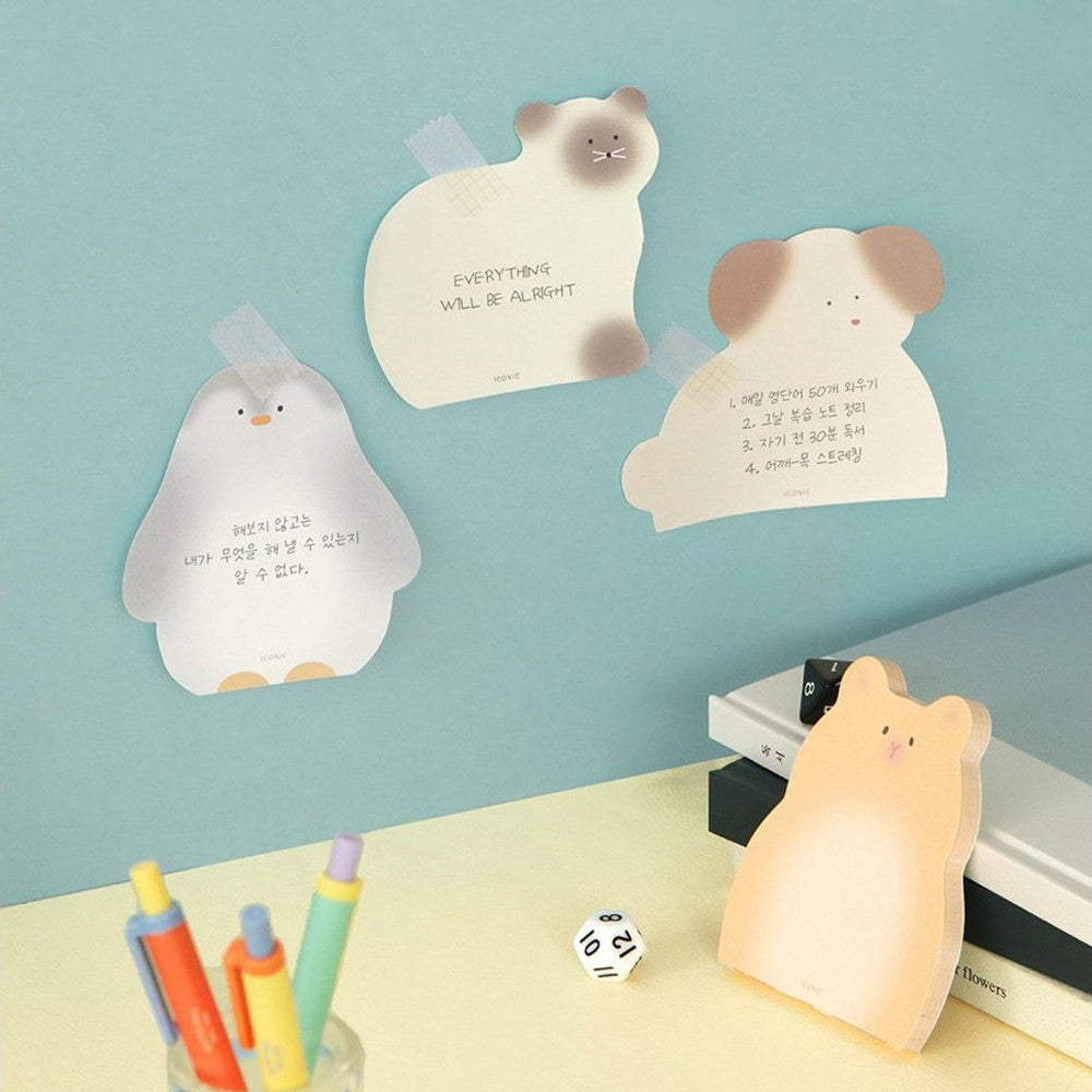 The Journal Shop - A selection of animal-shaped memo pads displayed together on pastel backgrounds.