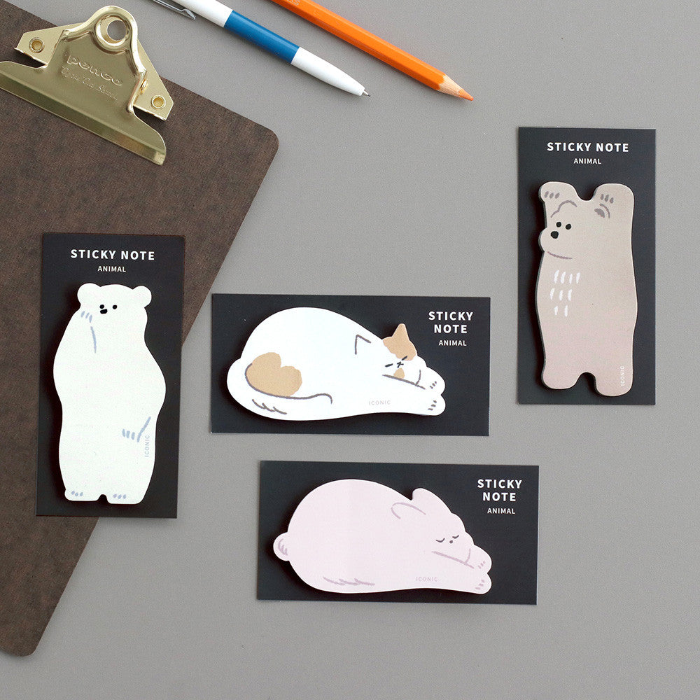The Journal Shop - Set of Iconic Animal Sticky Notes featuring bears, cat, and rabbit designs on a grey desk with clip board and pens.