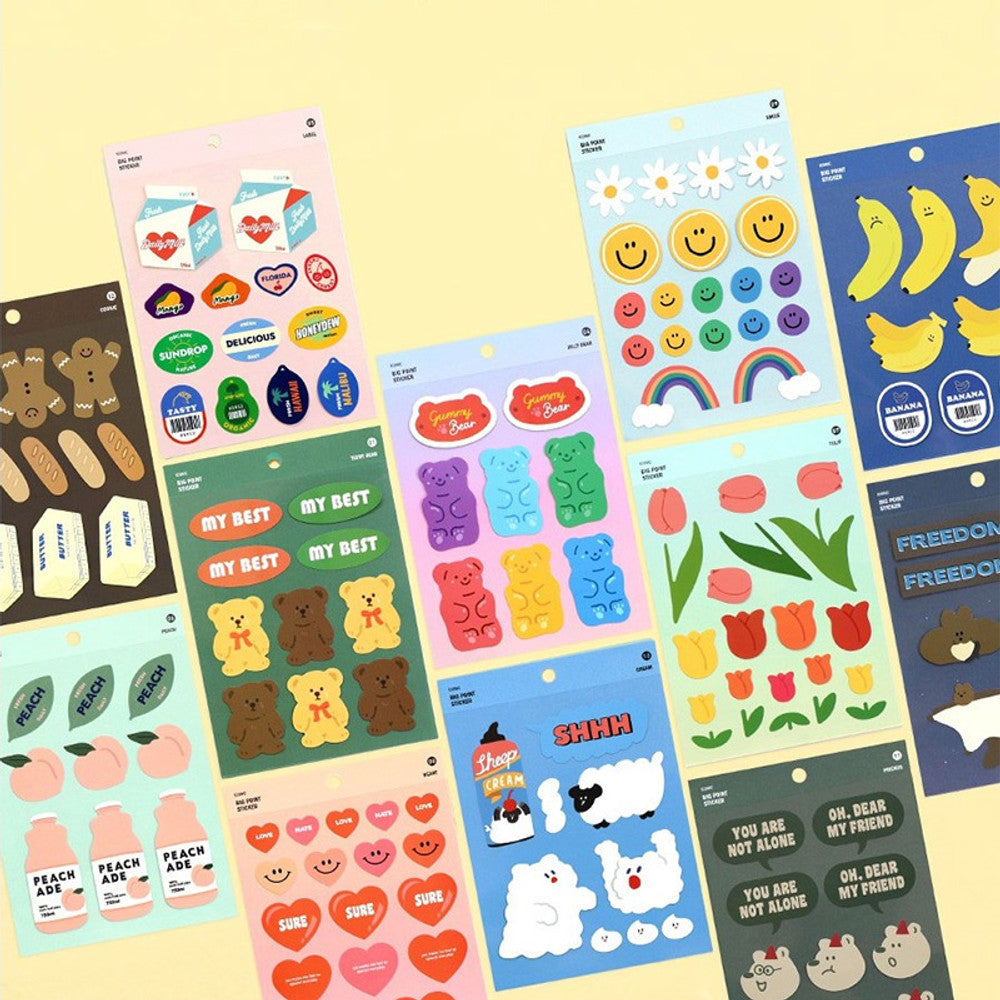 The Journal Shop - Collection of Iconic Big Point Sticker sheets in assorted designs and colours laid out on a pastel yellow background.