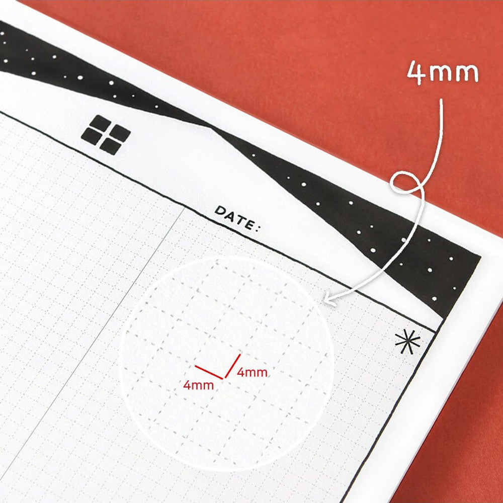 The Journal Shop - iconic doodle B5 grid notepad showing close up lay out.