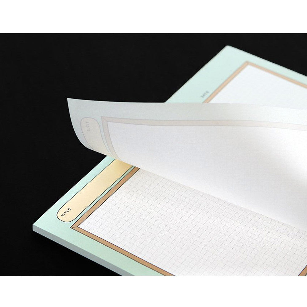 The Journal Shop - Iconic Blah Blah B5 Memo Notepad open showing perforated tear-off pages for easy note removal.