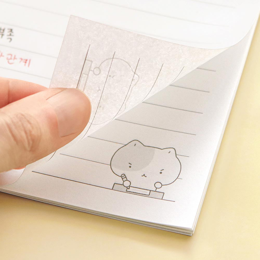 The Journal Shop - Iconic Blah Blah B5 Spiral Lined Notebook open to show lined pages with small doodle illustration in corner.