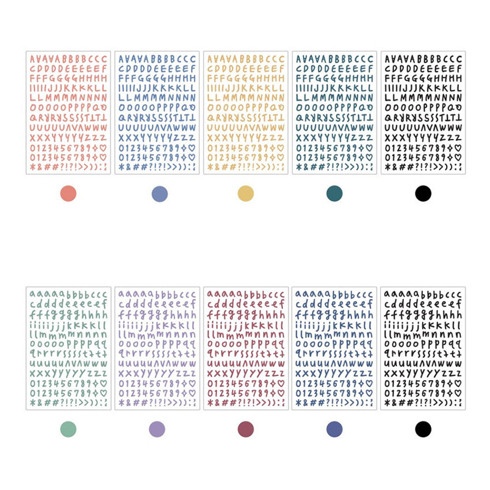 The Journal Shop - Multiple sets of alphabet stickers in pastel hues and serif-style fonts arranged side by side.