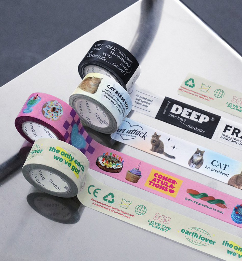 The Journal Shop - Close-up of Iconic Collect Masking Tape rolls in pink, black, and white, unrolled to reveal bold graphic designs.