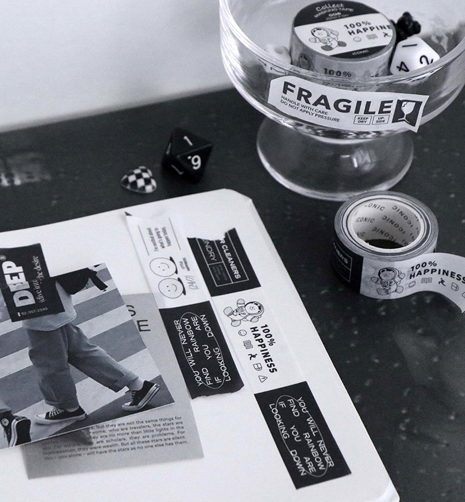The Journal Shop - Black-and-white themed Iconic Collect Masking Tape arranged neatly beside a notebook and small accessories.
