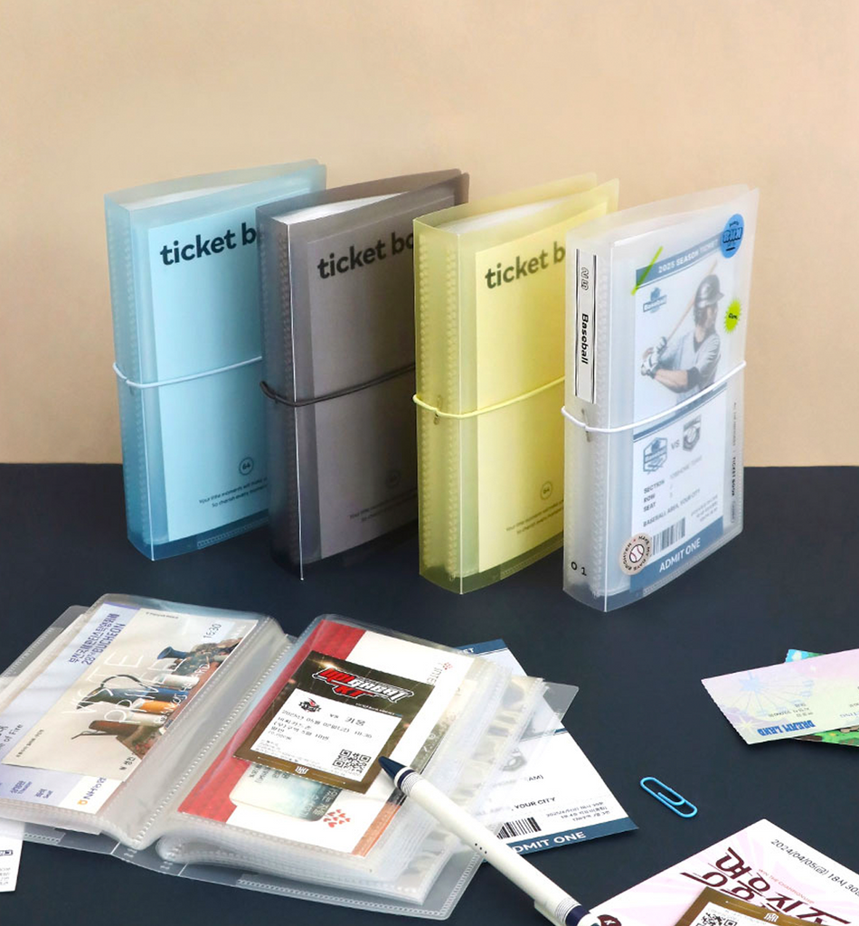 The Journal shop - Iconic Collect Ticket Book 64 pockets in assorted colours with tickets and stickers displayed.