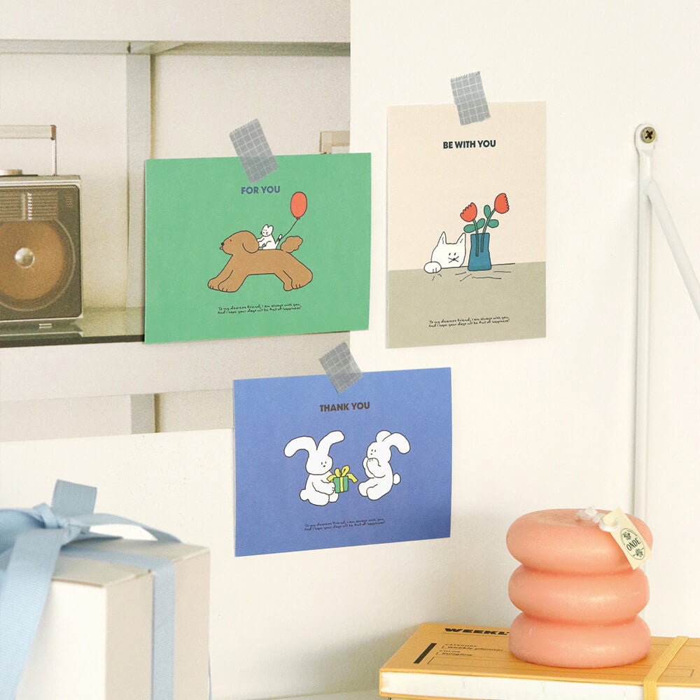 The Journal Shop - Iconic Cuddly Message Cards pinned on wall and displayed on shelf for decoration.