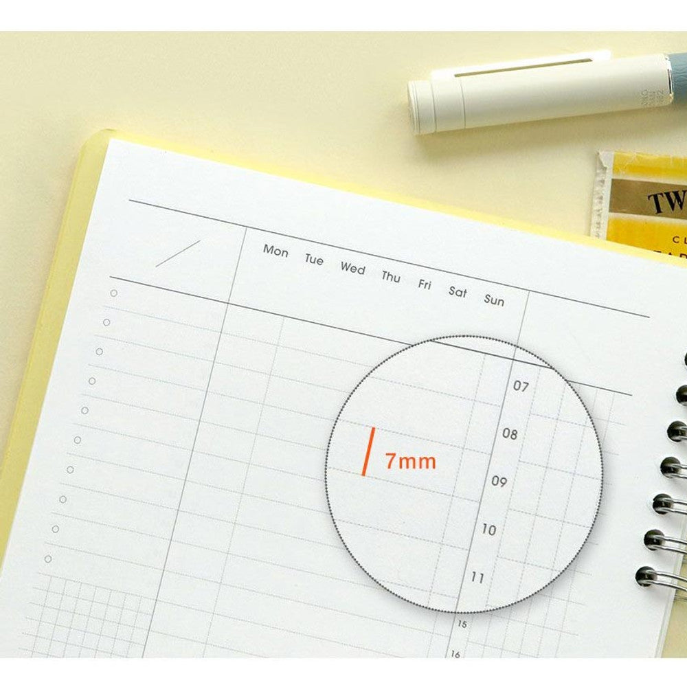 The Journal Shop - Iconic Daily A5 Study Planner dateless notebook page with circular daily time wheel layout.