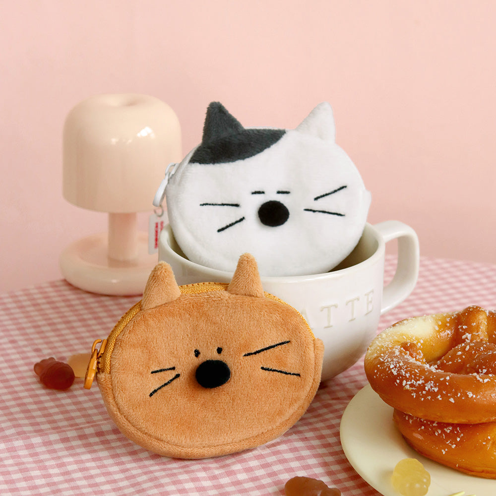 The Journal Shop - Close-up of white cat and brown cat Doodle Keyring Pouches shown with desserts.