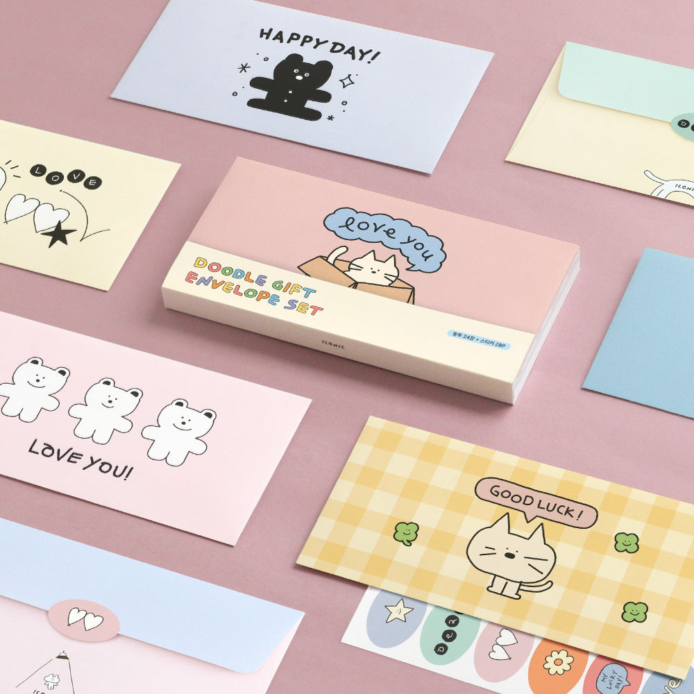 The Journal Shop - Assorted Iconic Doodle Envelopes in pastel colours with fun doodle prints laid out on a table.
