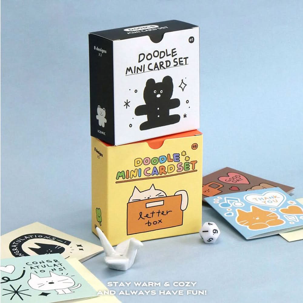 The Journal Shop - Iconic Doodle Mini Card Set black box with cards and envelopes arranged neatly beside stationery.