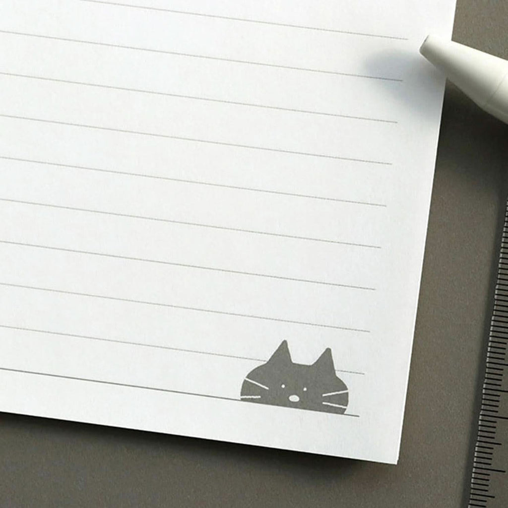 The Journal Shop - Iconic Doodle B5 Spiral Lined Notebook close-up of lined page with small doodle illustration in the corner.