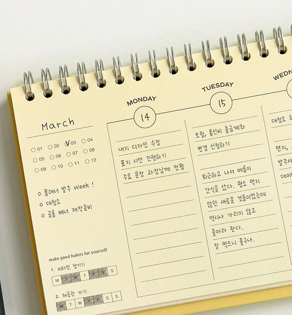 The Journal Shop - Close-up of handwritten notes inside the yellow Iconic Flow Weekly Planner.