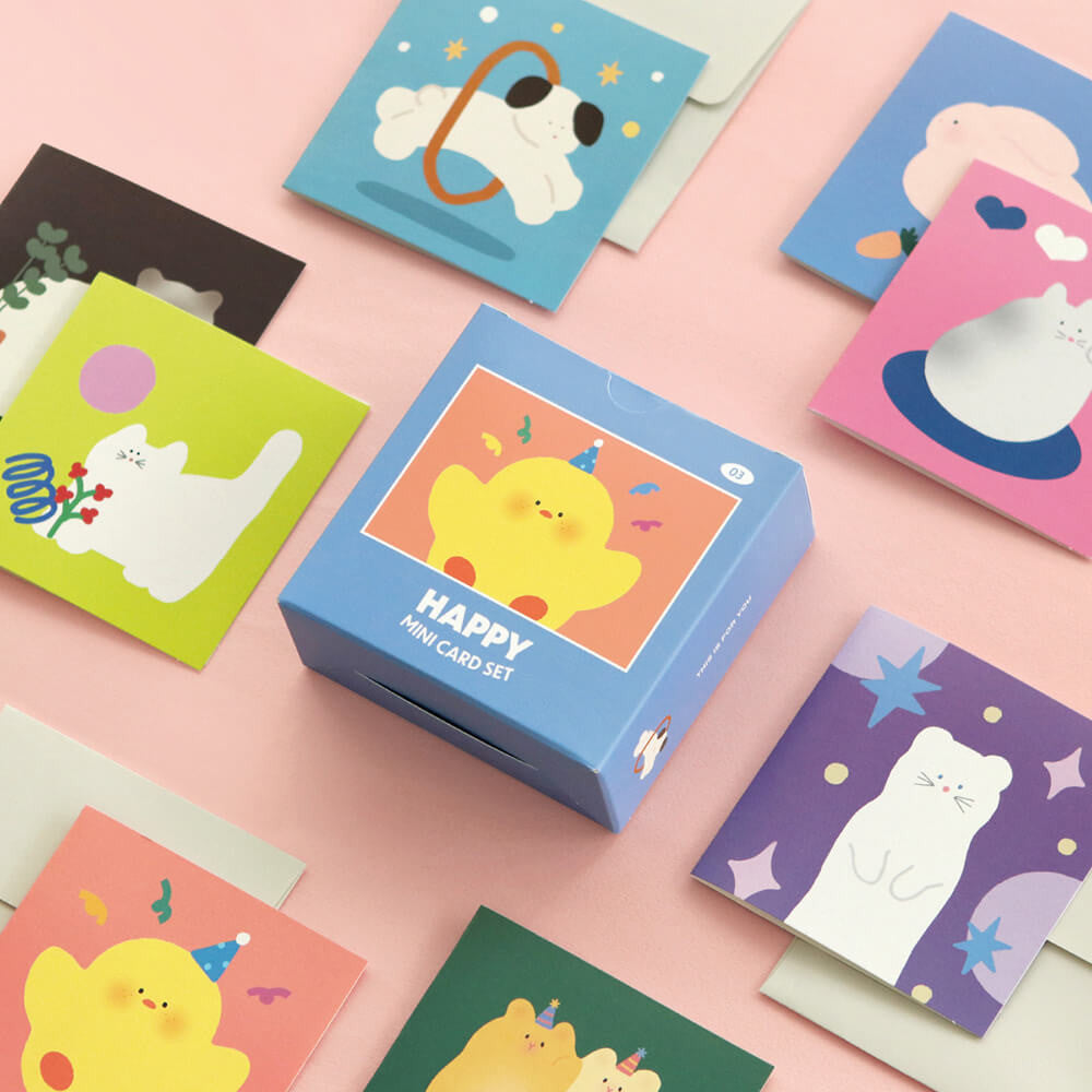 The Journal Shop - Iconic Happy Mini Card Set blue box with colourful animal-themed cards displayed on pink and green background.