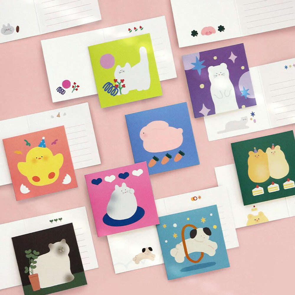 The Journal Shop - Iconic Happy Mini Cards in assorted animal designs with matching envelopes displayed on pink background.