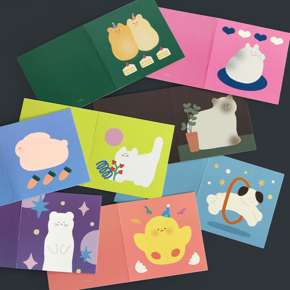The Journal Shop - Iconic Happy Mini Cards featuring colourful animal illustrations arranged neatly on dark background.