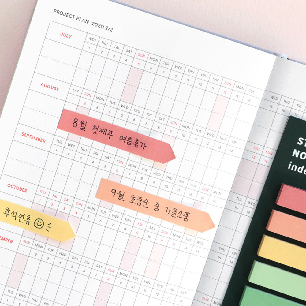 The Journal Shop - Study planner decorated with pastel sticky notes in various colours for easy reference.