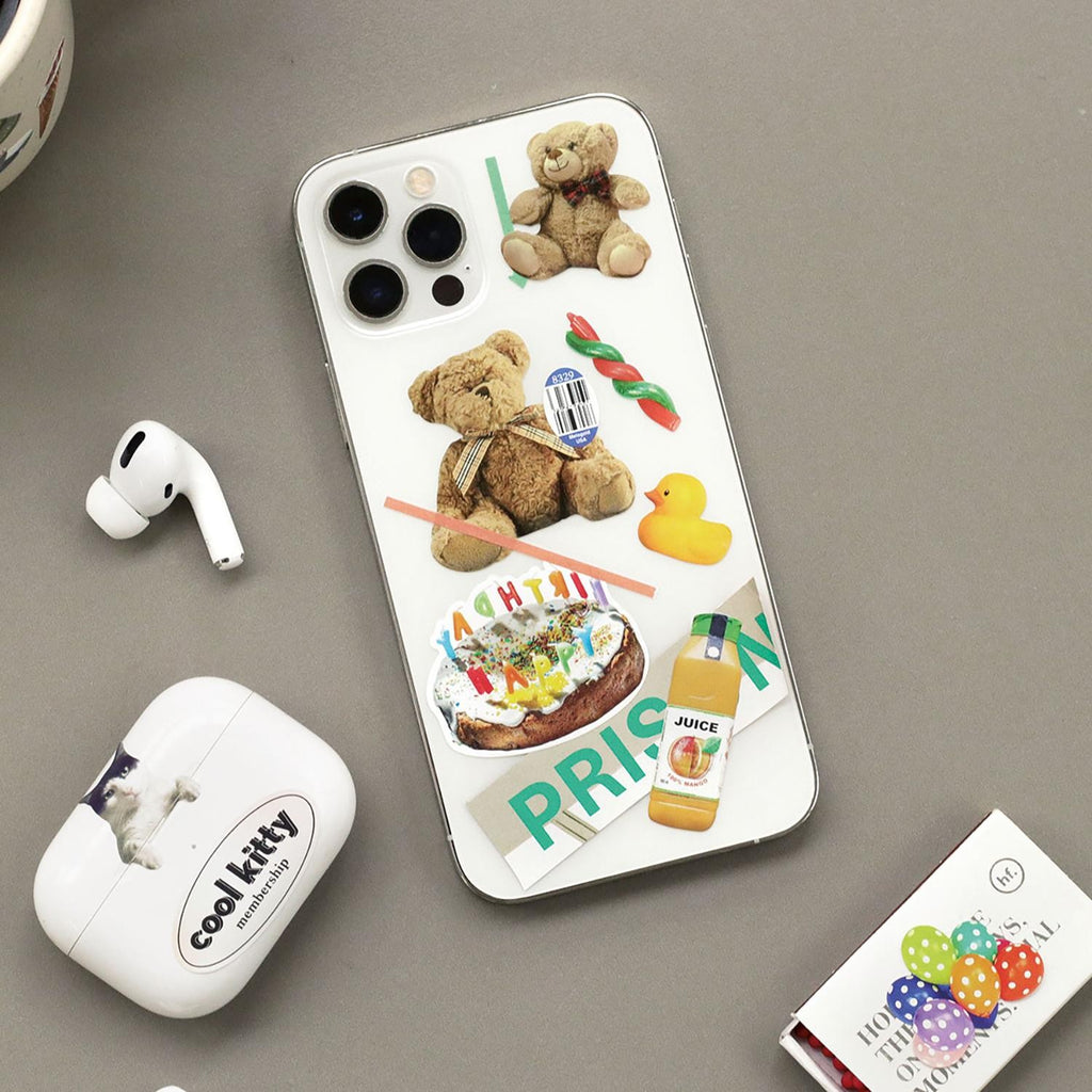 The Journal Shop - Smartphone and AirPods case decorated with Iconic Just Object Stickers.