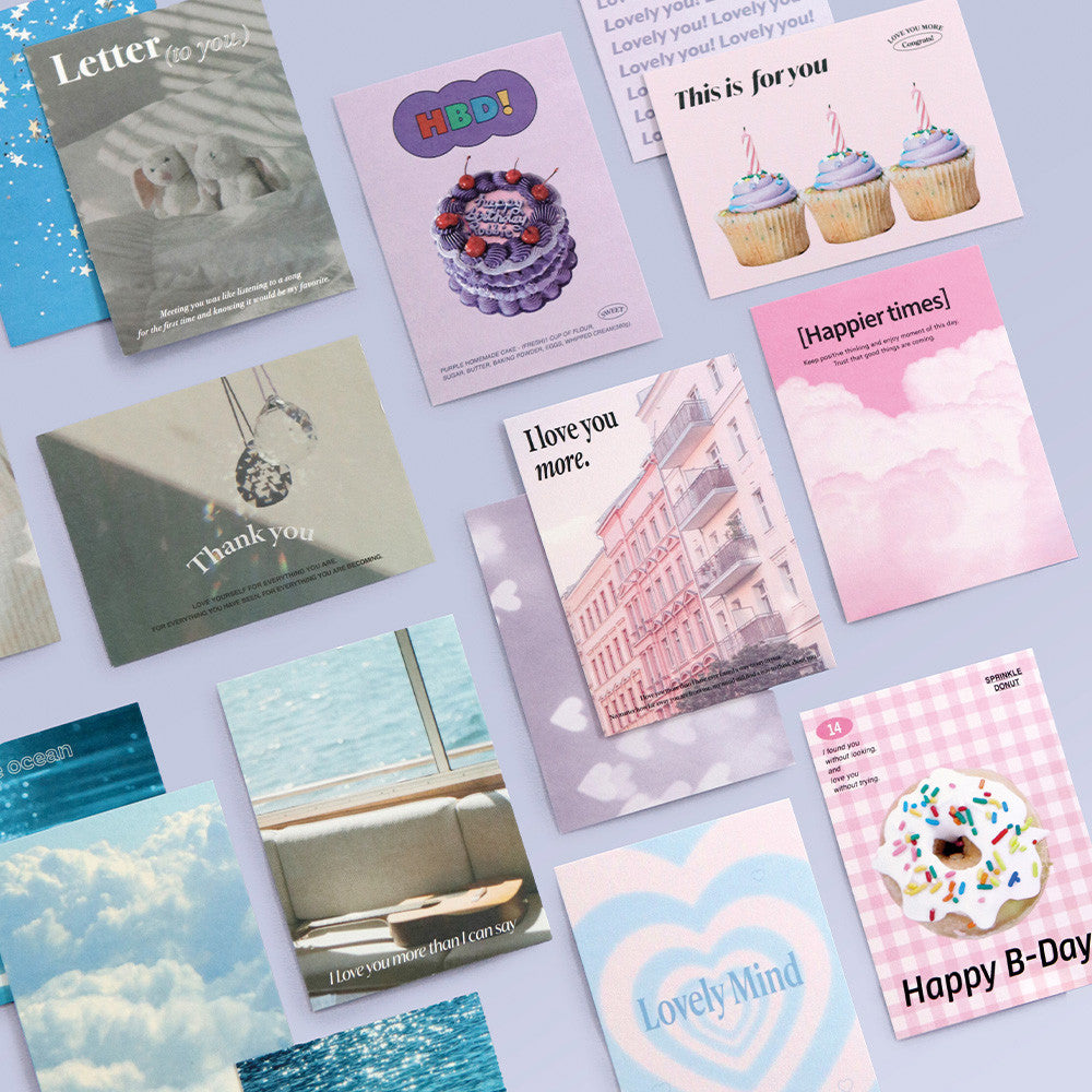The Journal Shop - Assorted Iconic Moodscape Message Cards, boxes, and envelopes in pink and blue colourways arranged neatly for display.