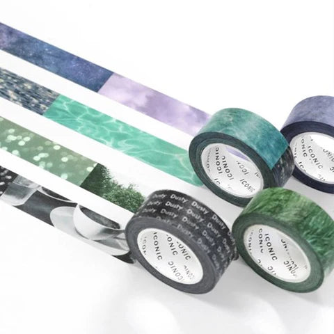 The Journal Shop - A set of Iconic Photo Masking Tapes in blue, green, and purple hues displayed on a white background with strips unrolled to show landscape designs.