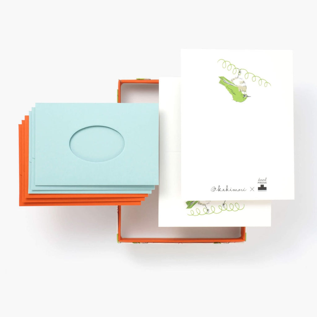 The Journal Shop - Set of Kakimori Spring Bird stationery with blue and orange envelopes arranged on a white background.