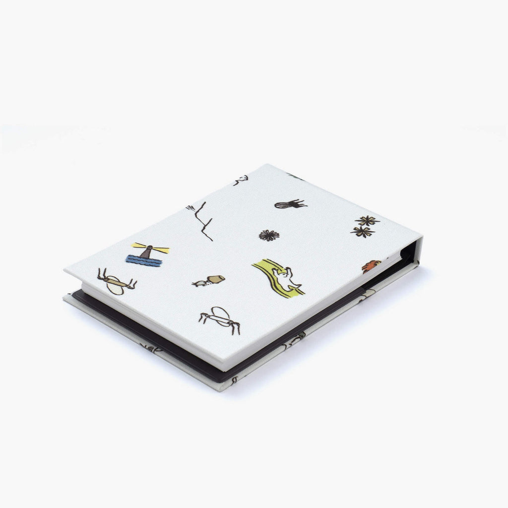 Kakimori Mini Note Cover in Memory pattern, laid flat to show full nostalgic print