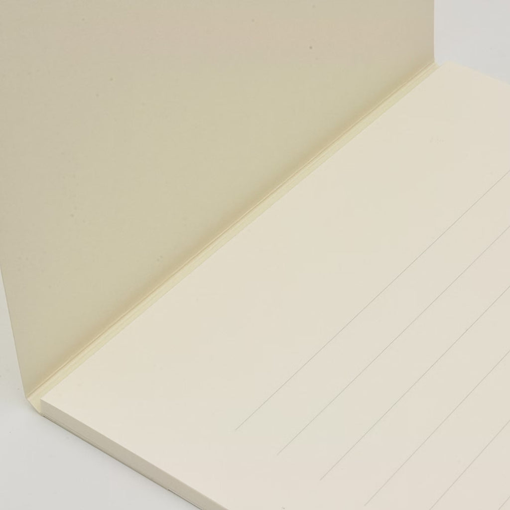 Open GRAPHiLO notepad showing faint horizontal lines on the bottom page.